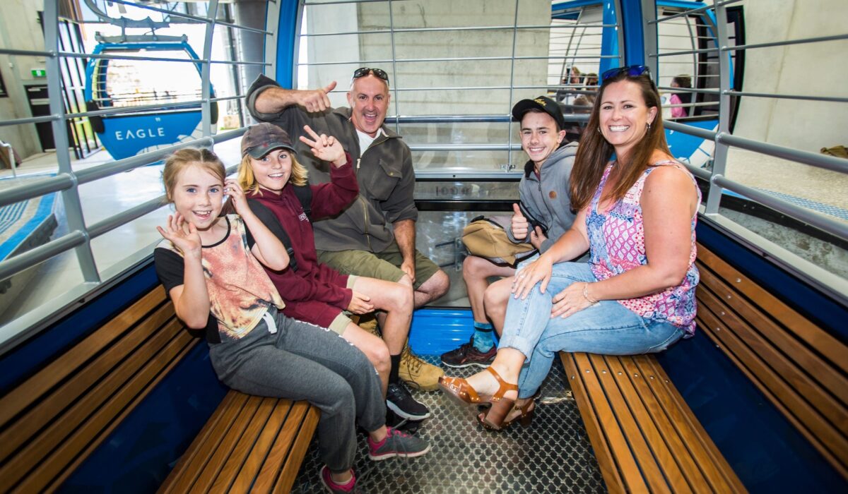Family in Gondolas at Arthurs Seat Eagle